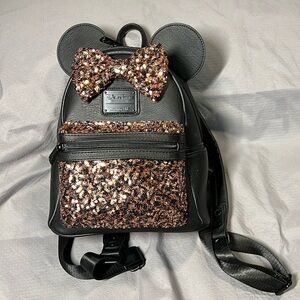 Belle of the Ball Bronze Loungefly backpack.